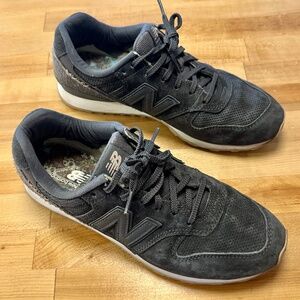 Women's New Balance 696 sneaker classic casual tennis shoe in dark gray, size 9